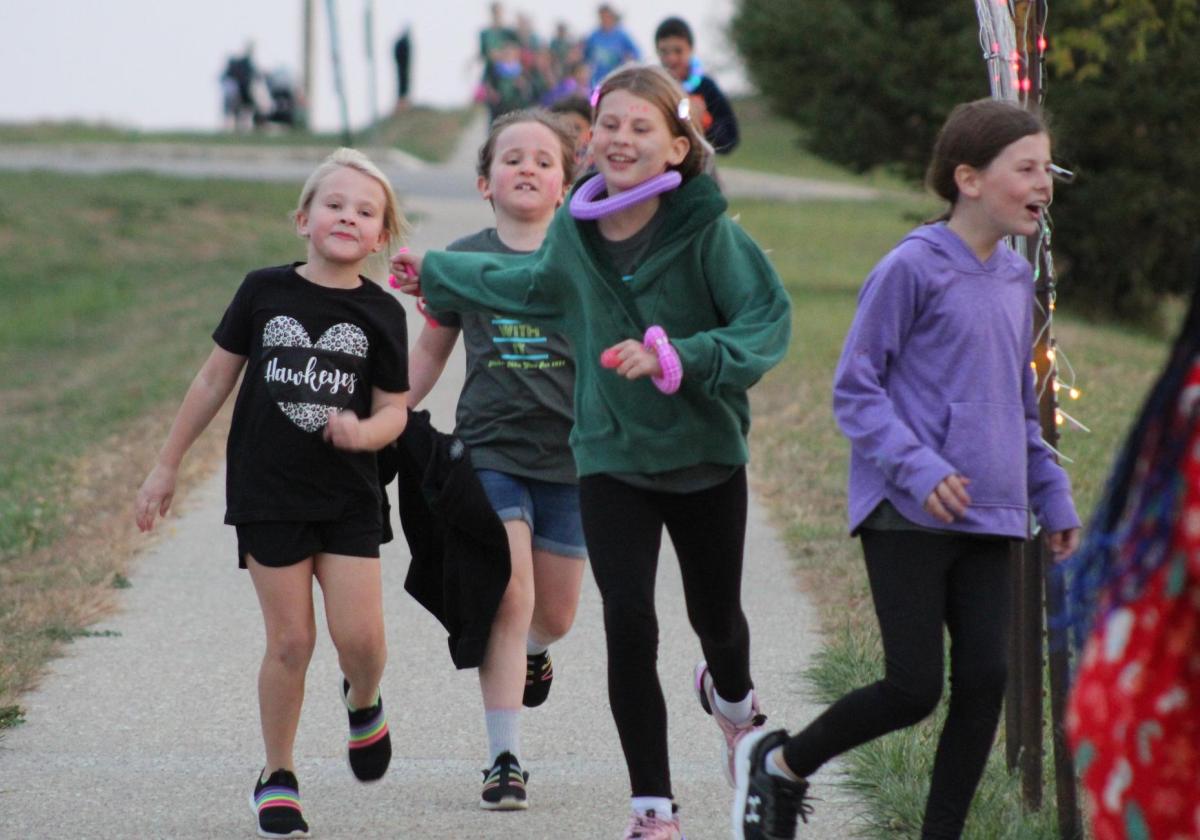 The Kids Glow Run kicked off the night at the 4th Annual Nathan's Miles Fun Run...bringing smiles to the children running! . Click to read article