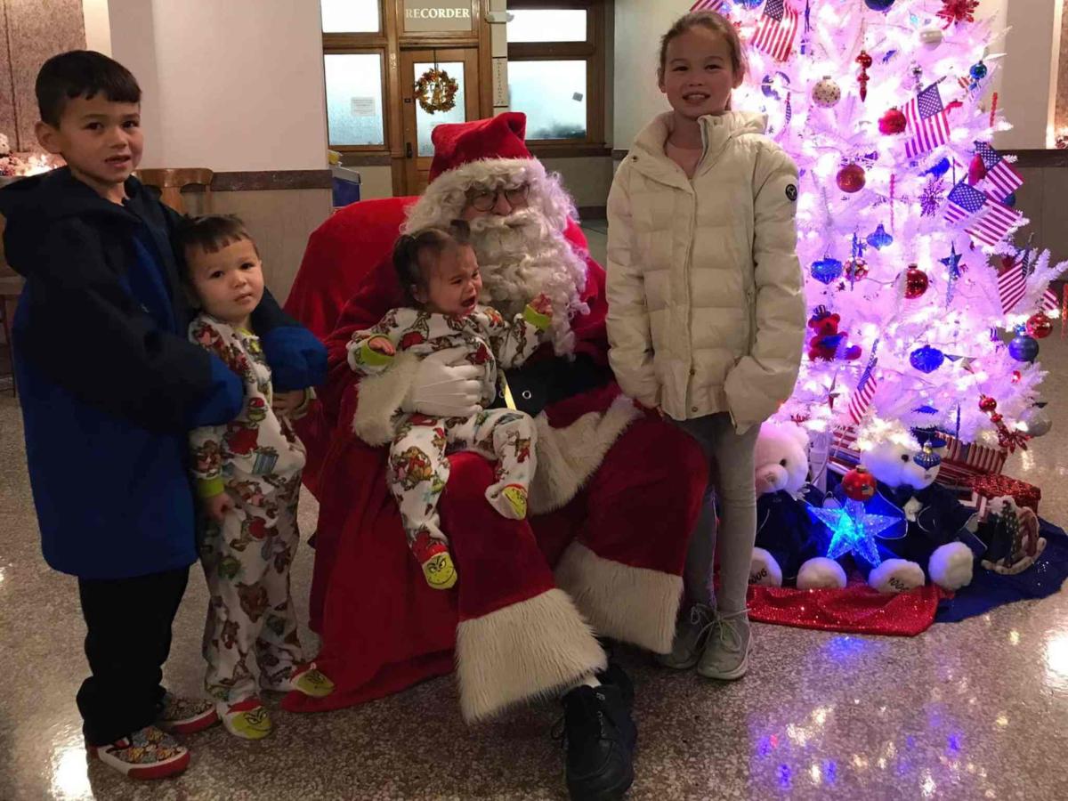 Santa welcomed the children at the courthouse following the parade.