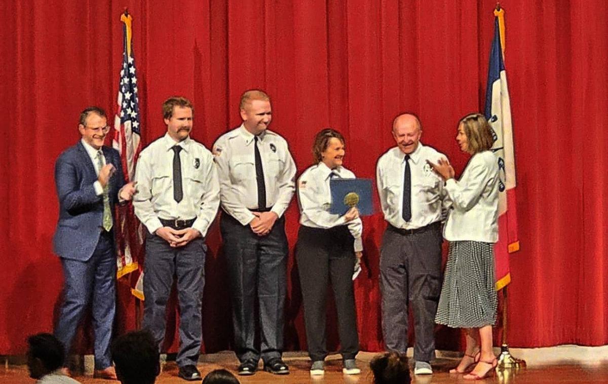 Blairstown Ambulance crew receiving recognition from Governor Reynolds for their work