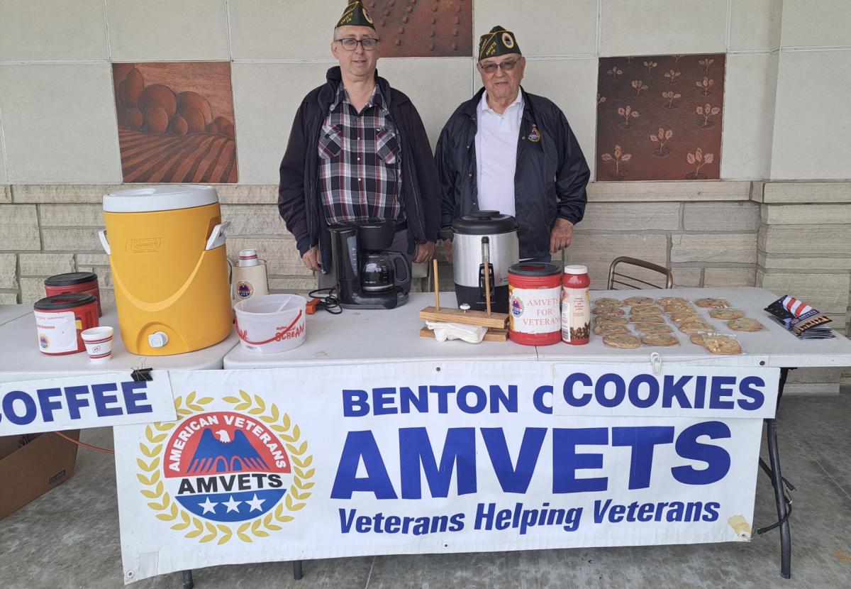 Article Thumbnail. Benton County Amvets Post 218 member Doug Wood and Finance Officer Ron Albright take a turn at manning the table at the Interstate 380 rest stop. 