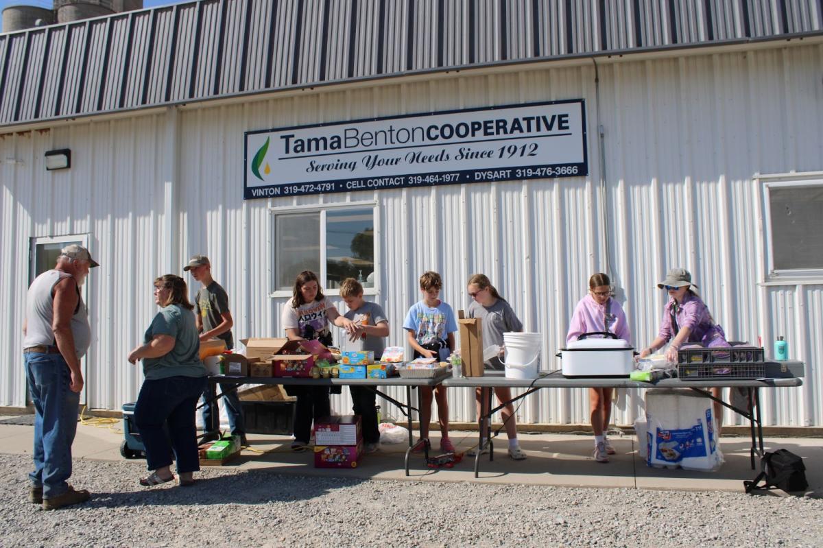 Many Middle and High School FFA members packaging meals for the farmers.